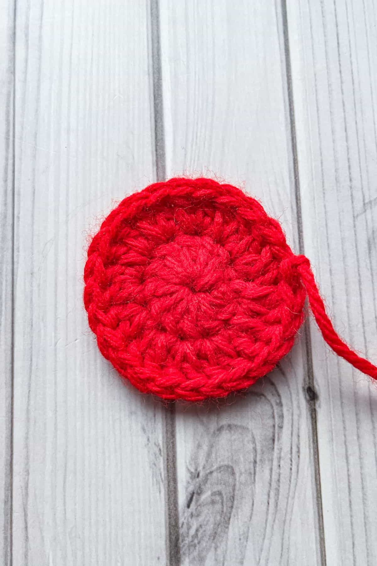 Second round of making flat crochet cherries.