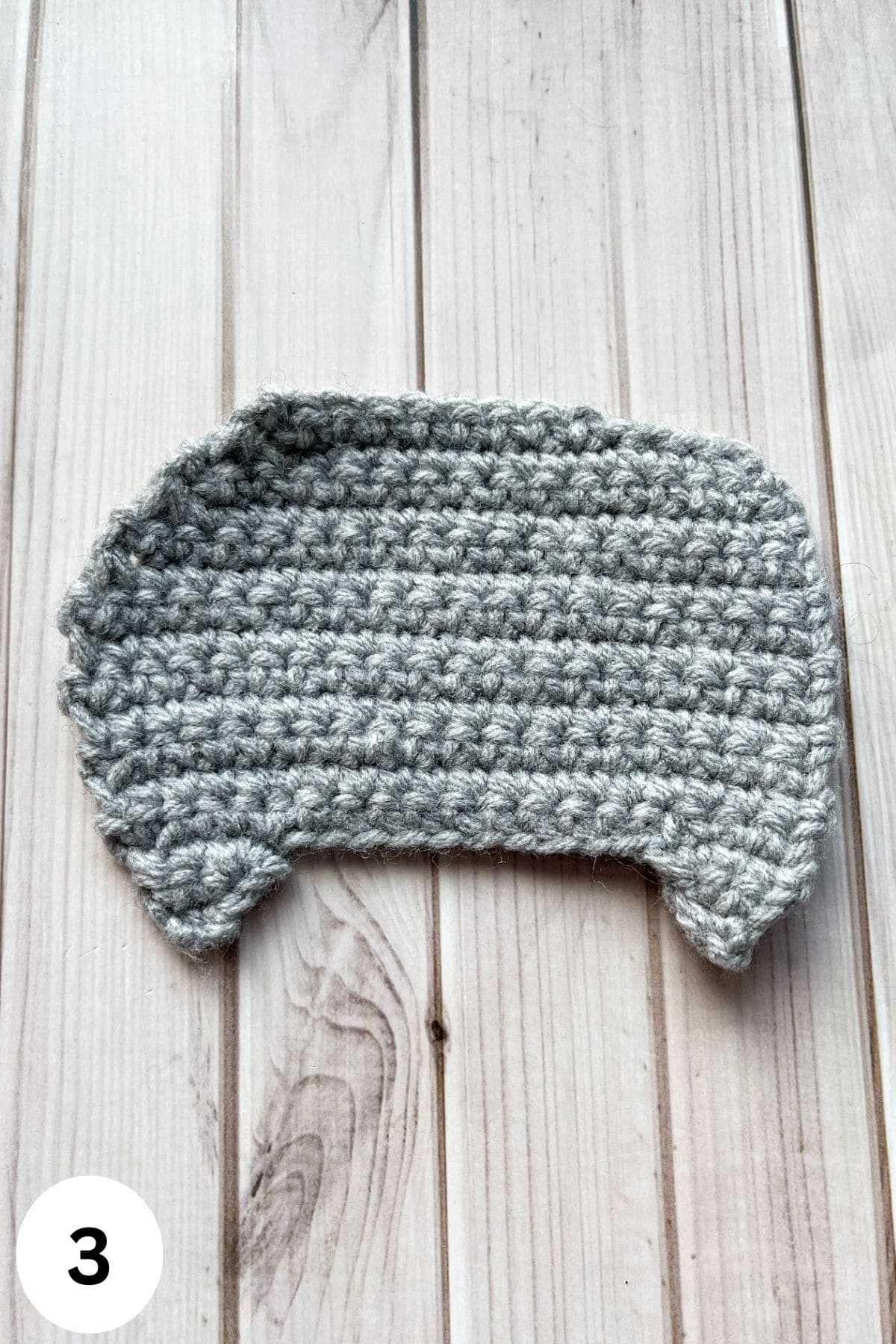 Finished body of the crochet possum applique.