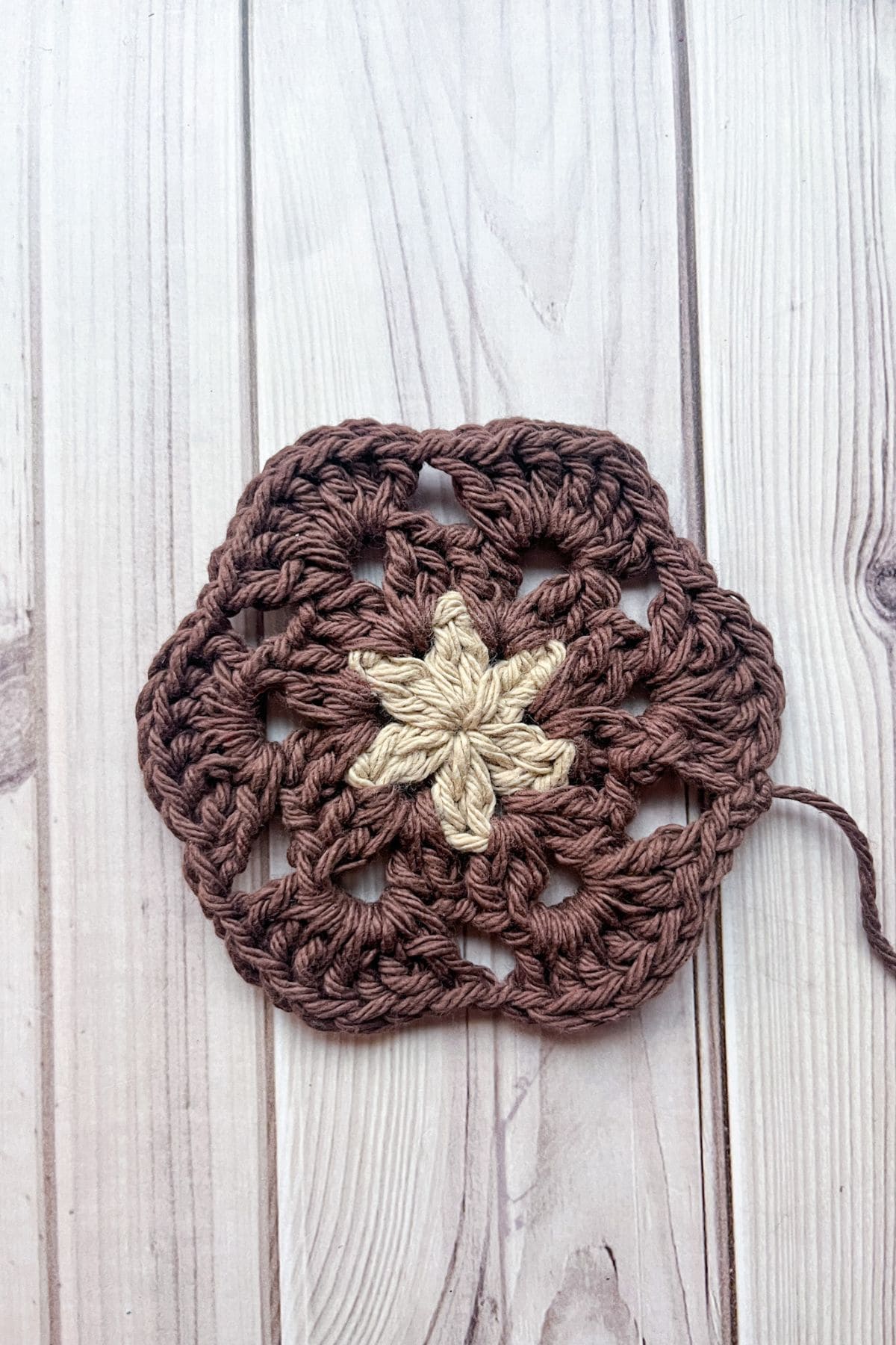 Third round of the 6 petal crochet African flower motif.