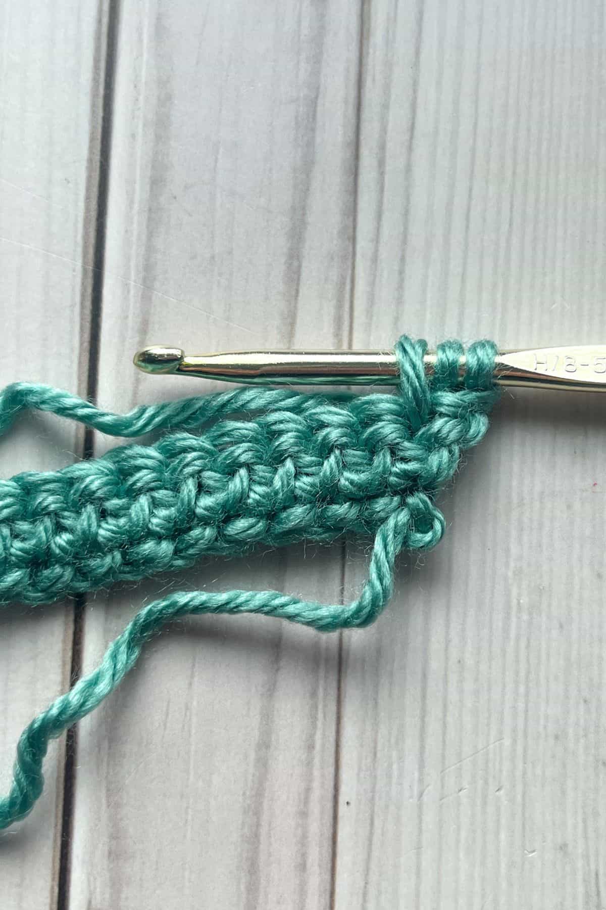 Herringbone double crochet stitch in progress.