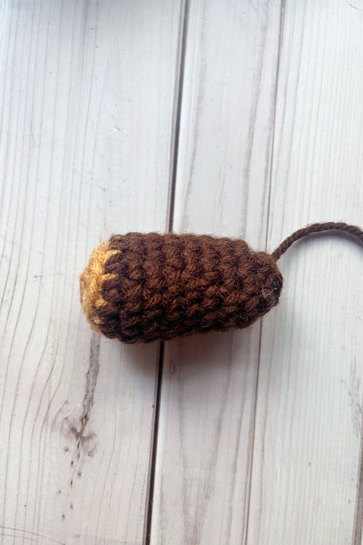 One piece of the crochet campfire logs.