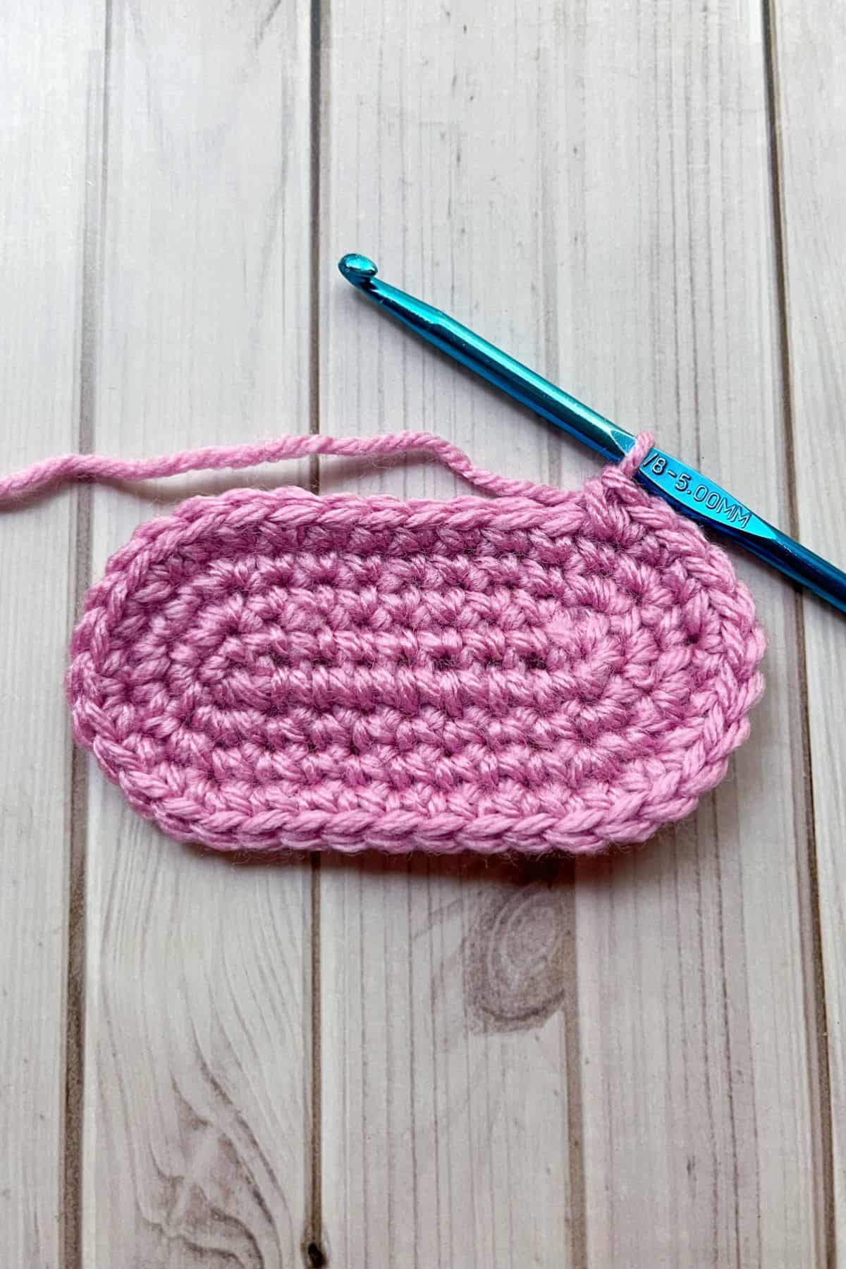 Working on the single crochet oval.