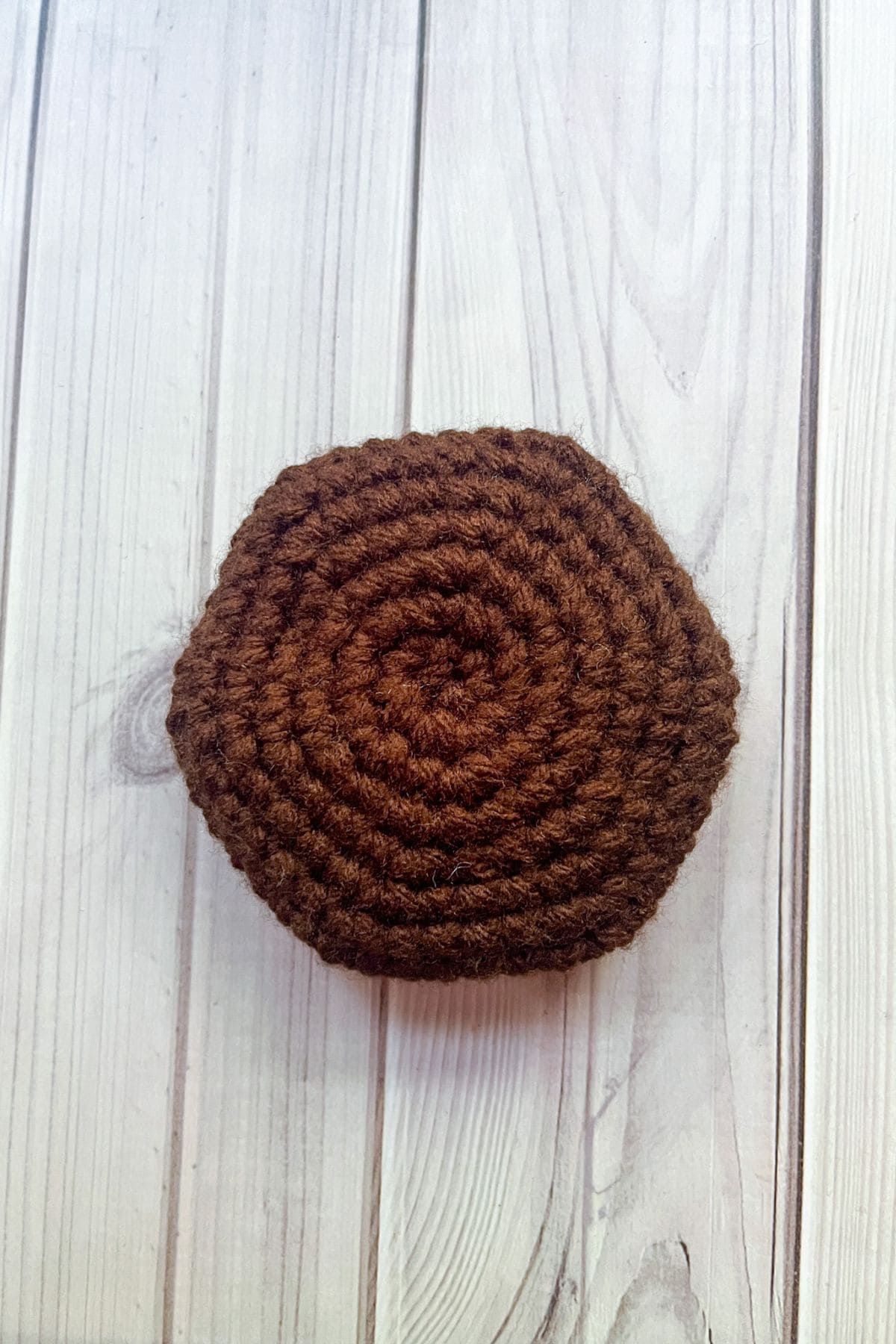 Crochet hamburger patty.