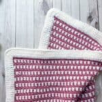 Finished moss stitch crochet blanket.