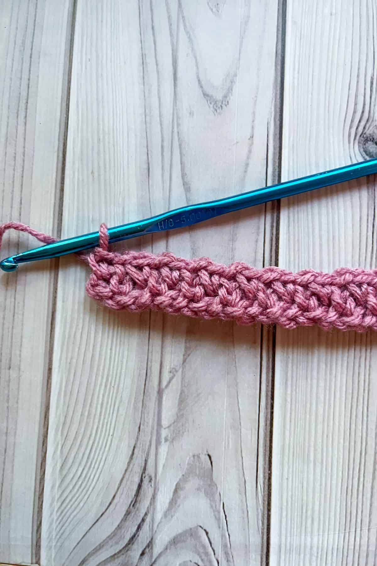 Second row of the moss stitch.