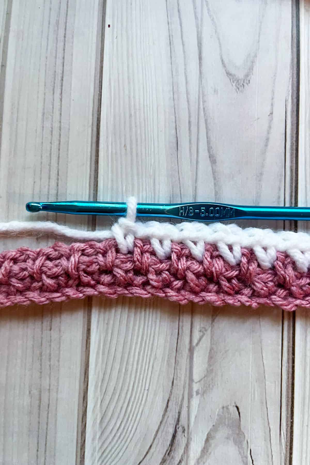 Moss stitch in white.