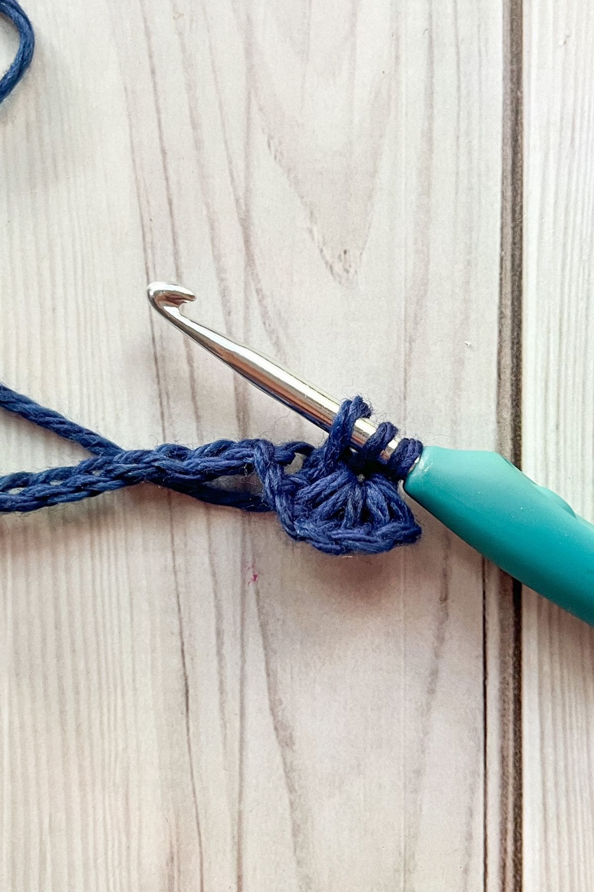 Making the crochet star stitch.