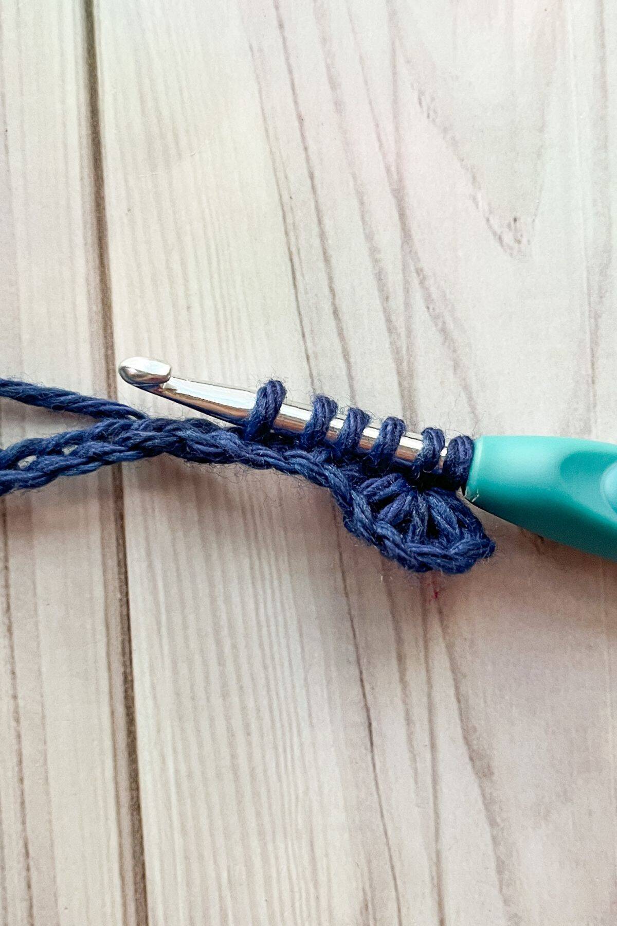Making the crochet star stitch.