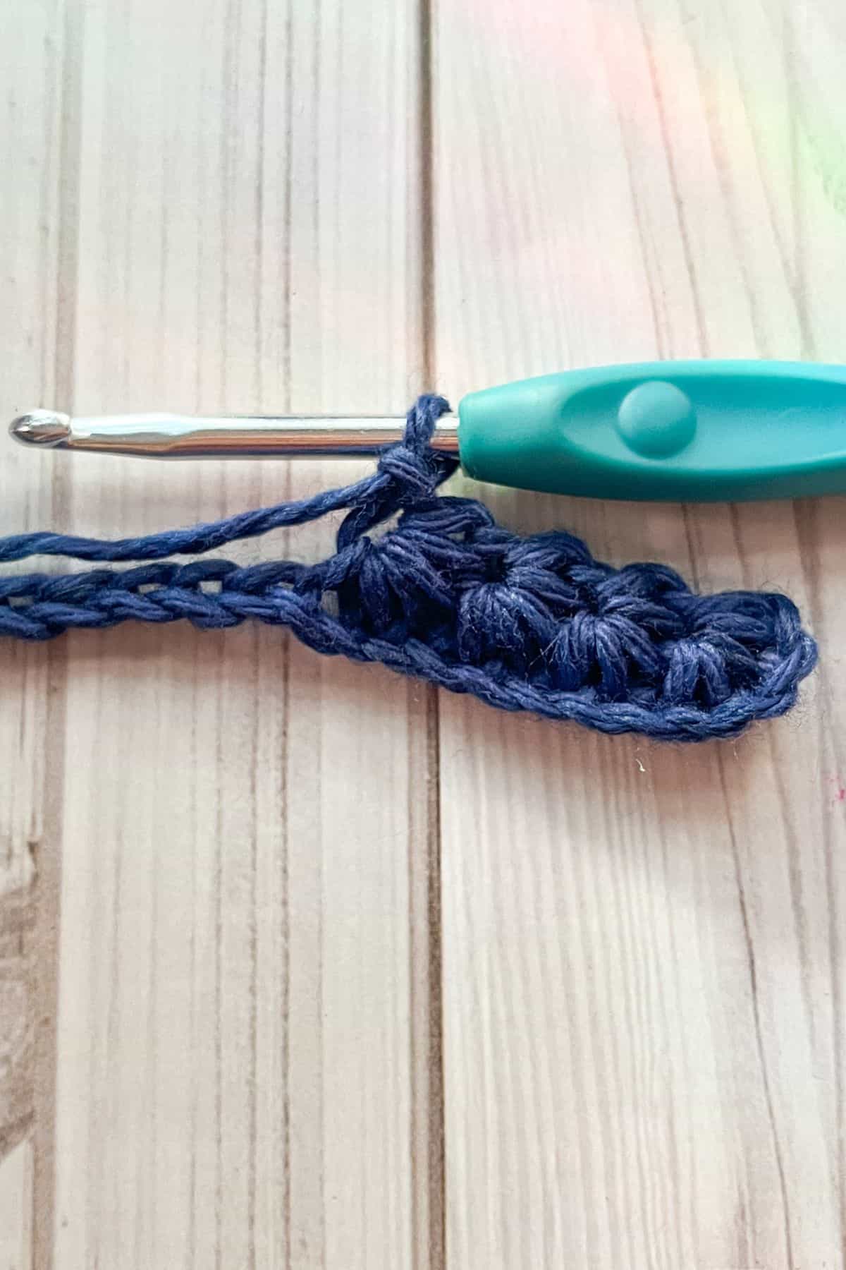 Repeated crochet star stitch.
