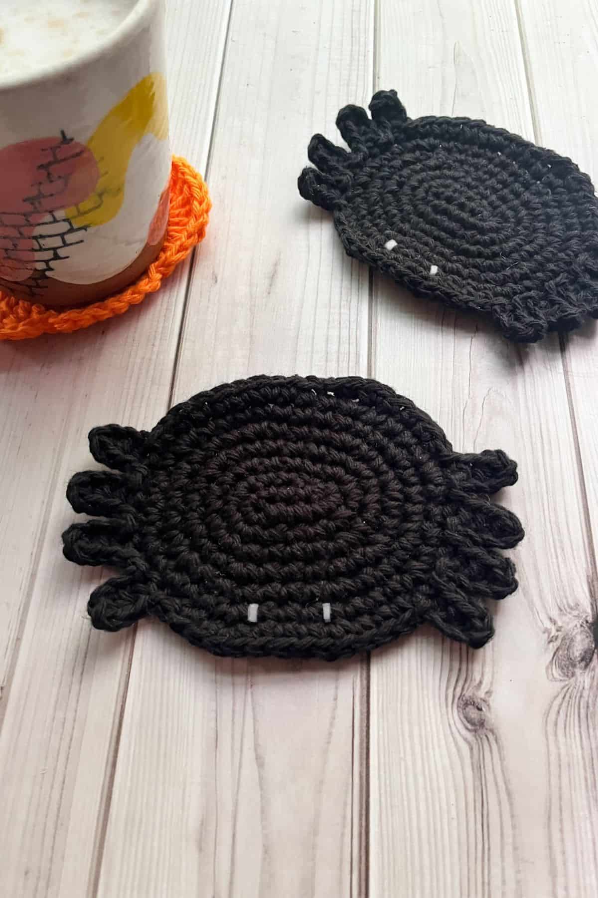 Finished crochet spider coaster.