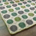 Finished granny square baby blanket.