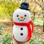 Finished crochet snowman outside.