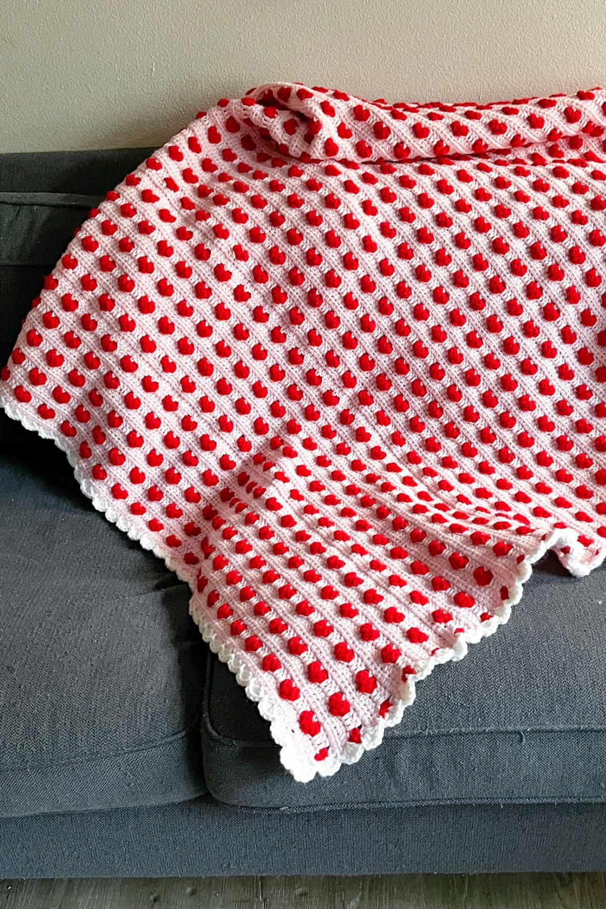Finished crochet heart blanket pattern.