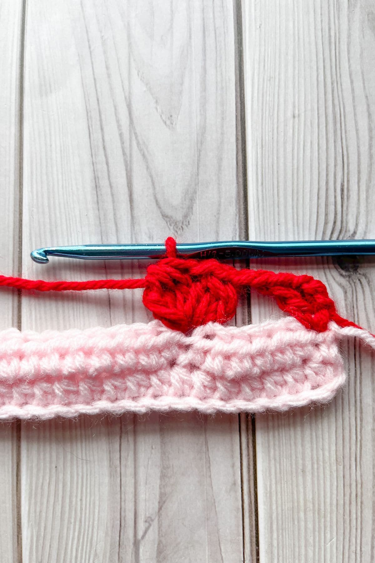 Making the first heart stitch.