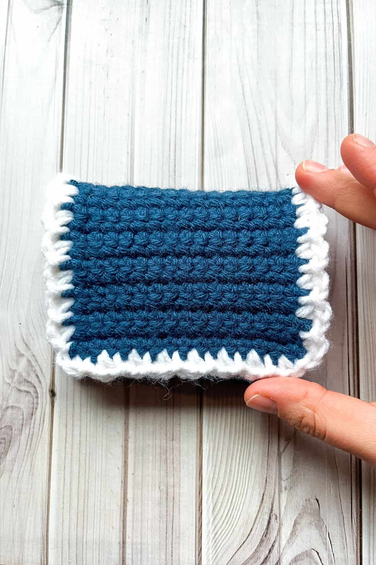 Fold over the crochet lid to make sure it fits well.