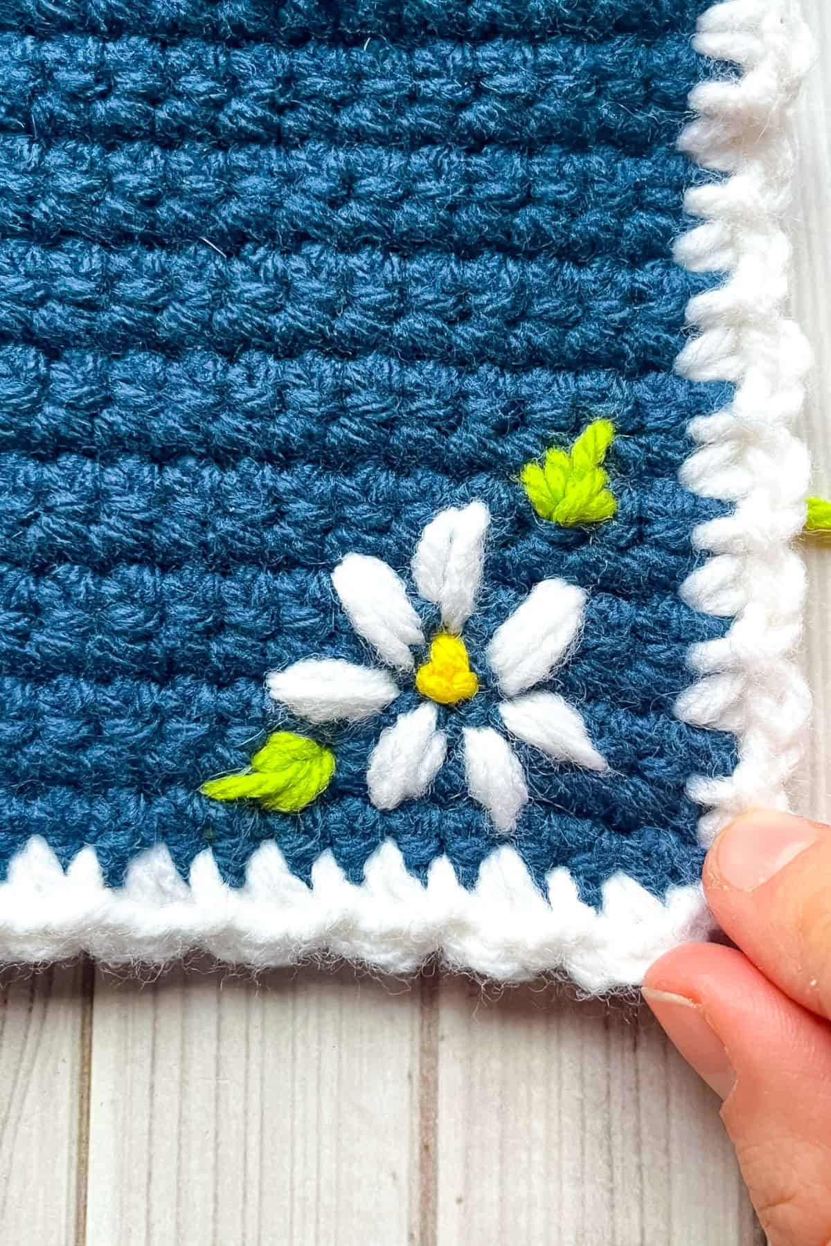 Embroidery flower detail for wallet.