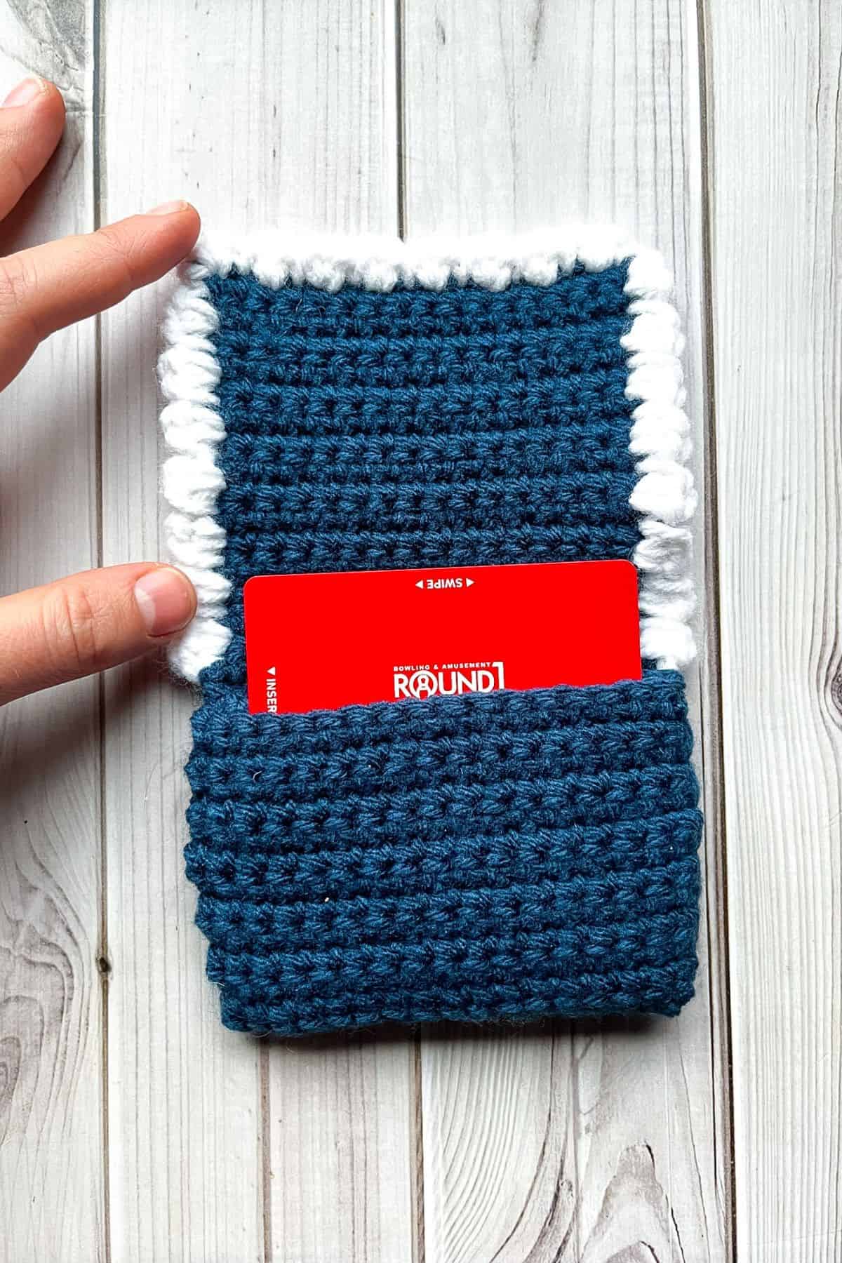 Showing how cards fit in the wallet.