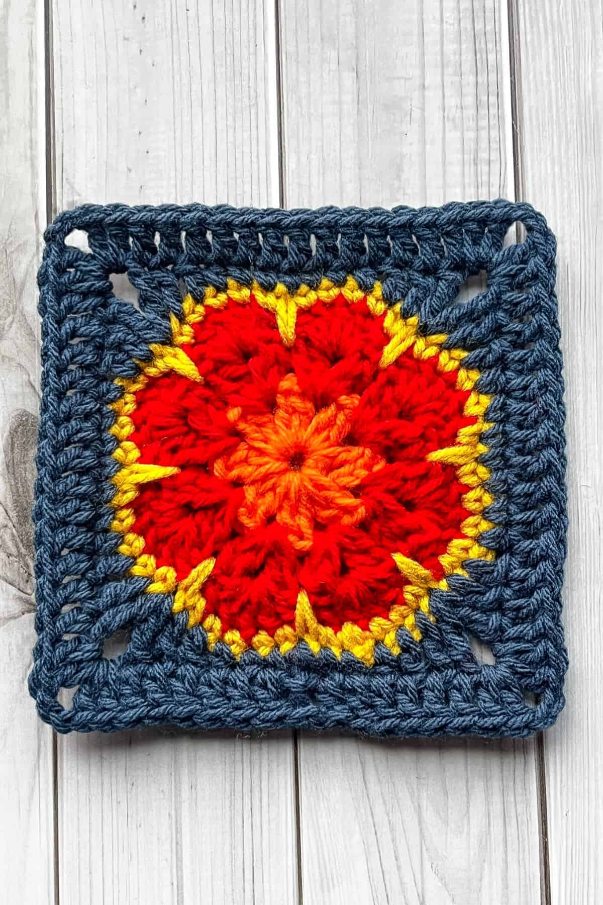 Finished round 6 of the crochet African flower granny square.