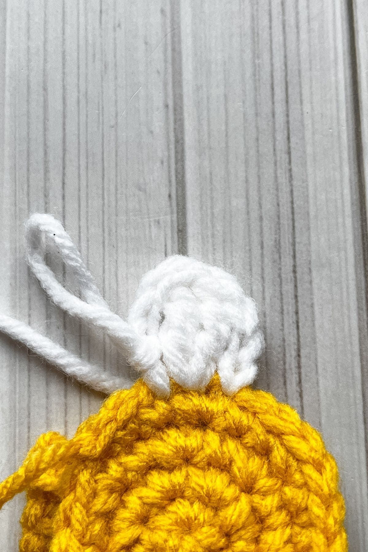 First petal for the daisy keychain completed.