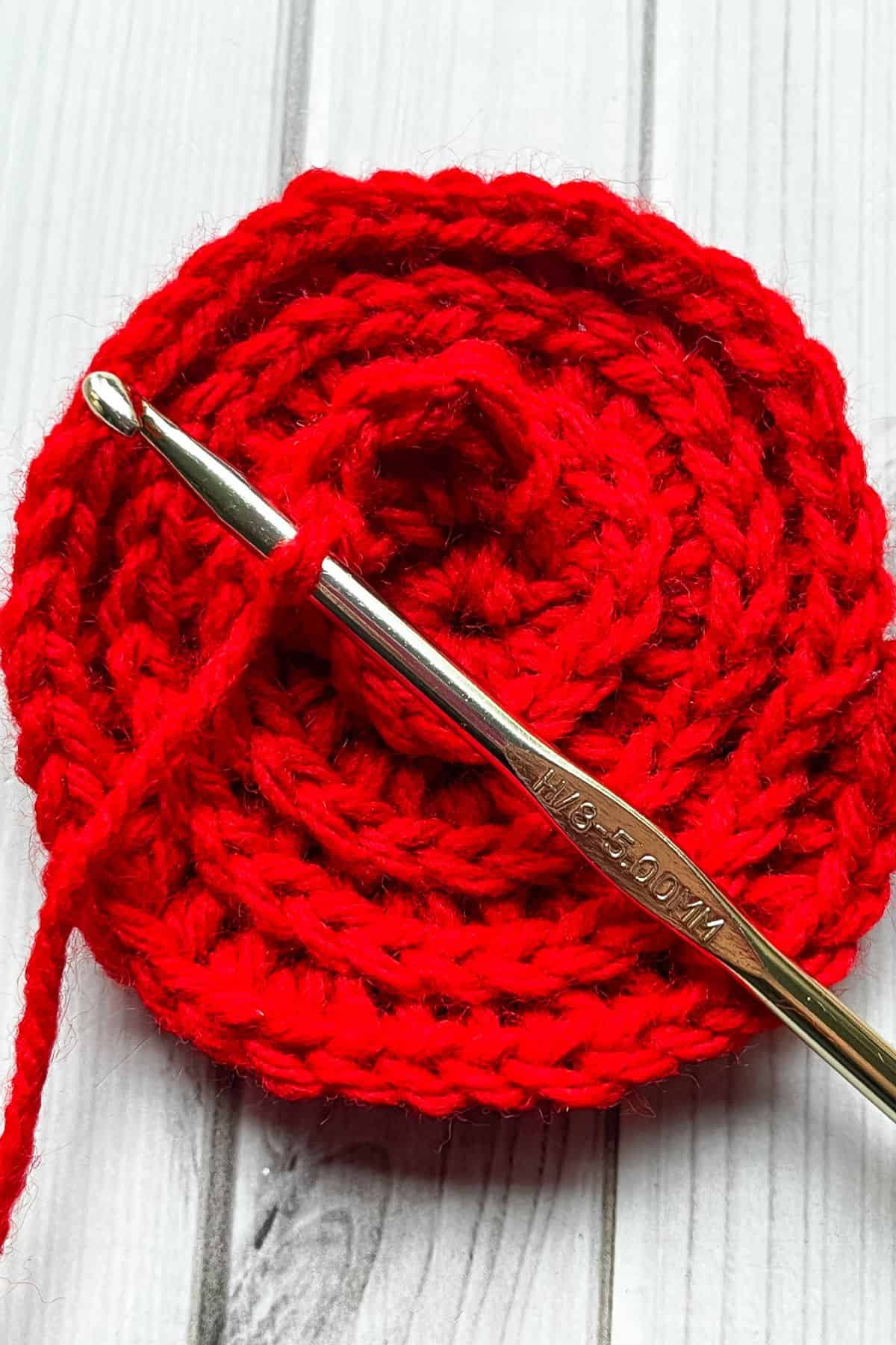 Starting to crochet the flower petals for the rose granny square.