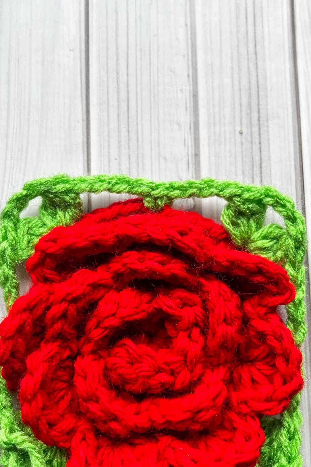 Showing a close up of the green round for the rose granny square.