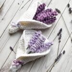 Finished crochet lavender bouquets on table with dried lavender.