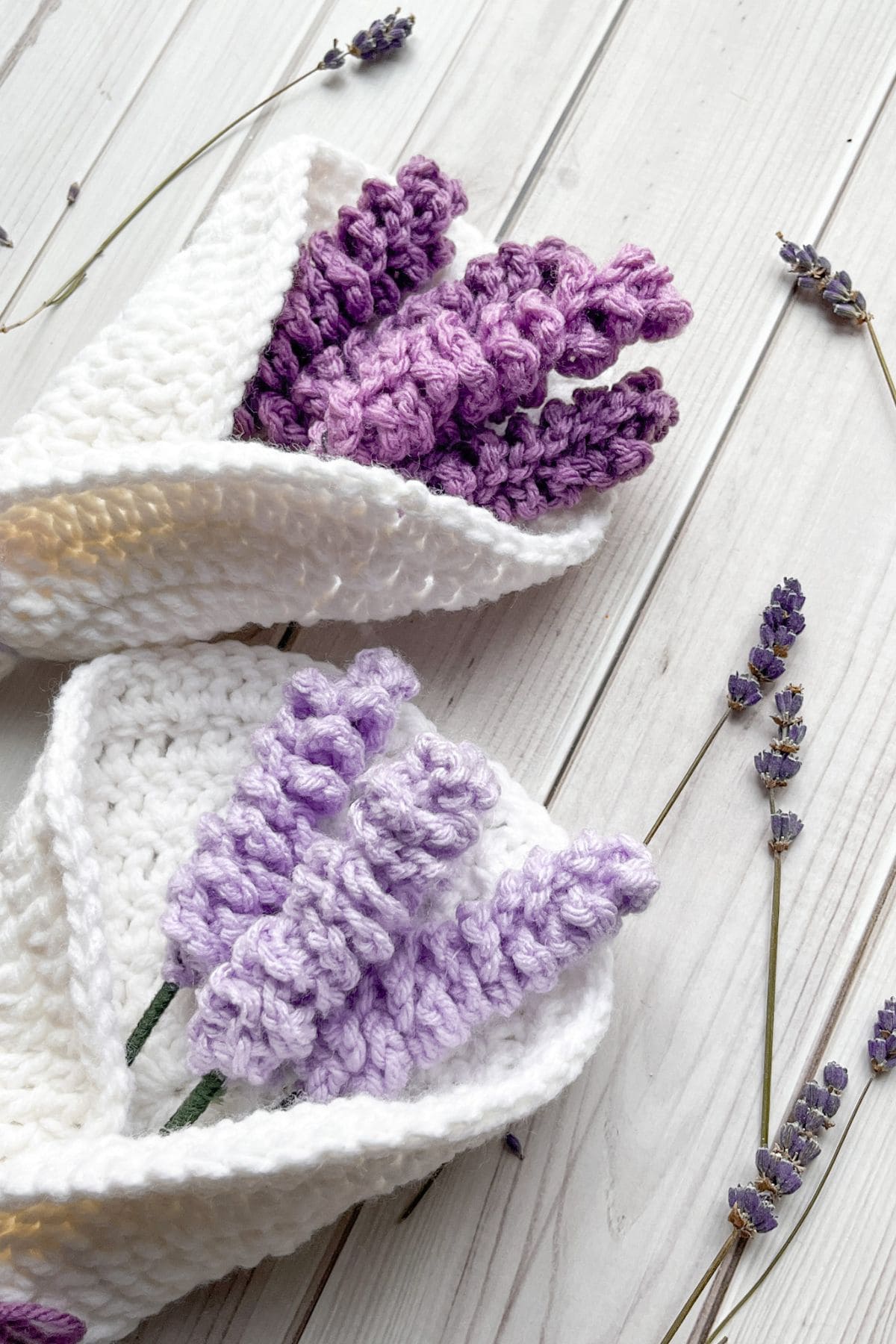 Finished crochet lavender bouquets on table with dried lavender.