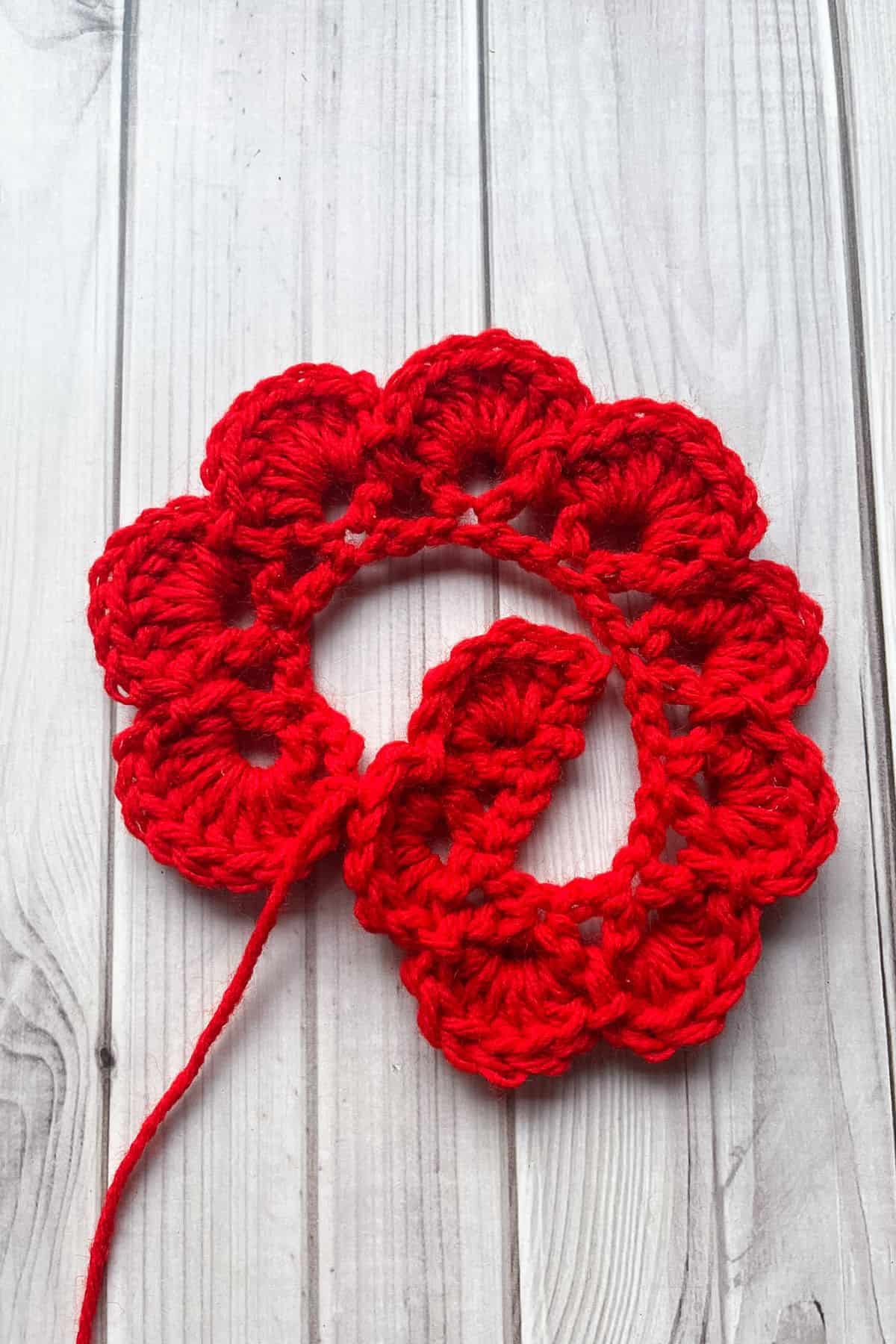 Crochet petals have been finished crocheting and naturally curve before being rolled up.