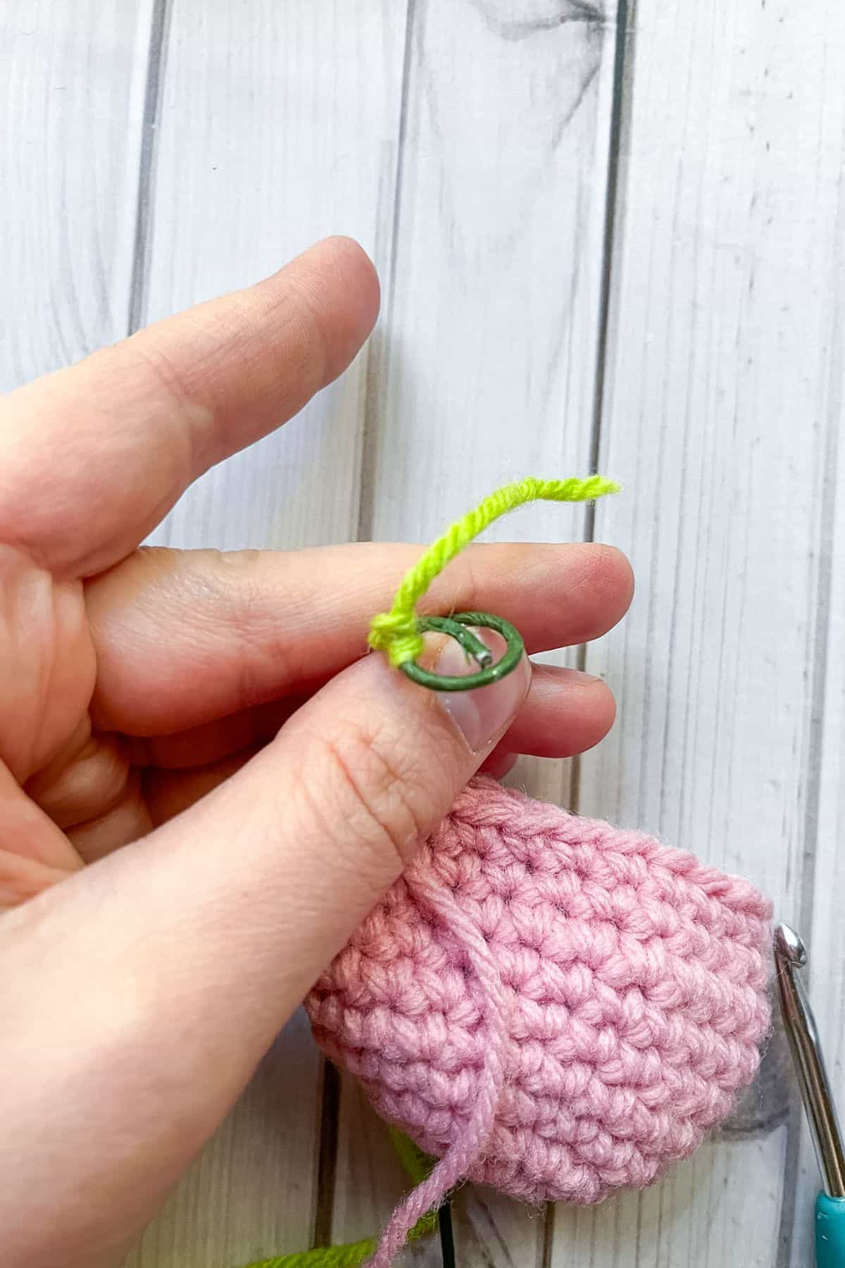 Attaching yarn to the wire.