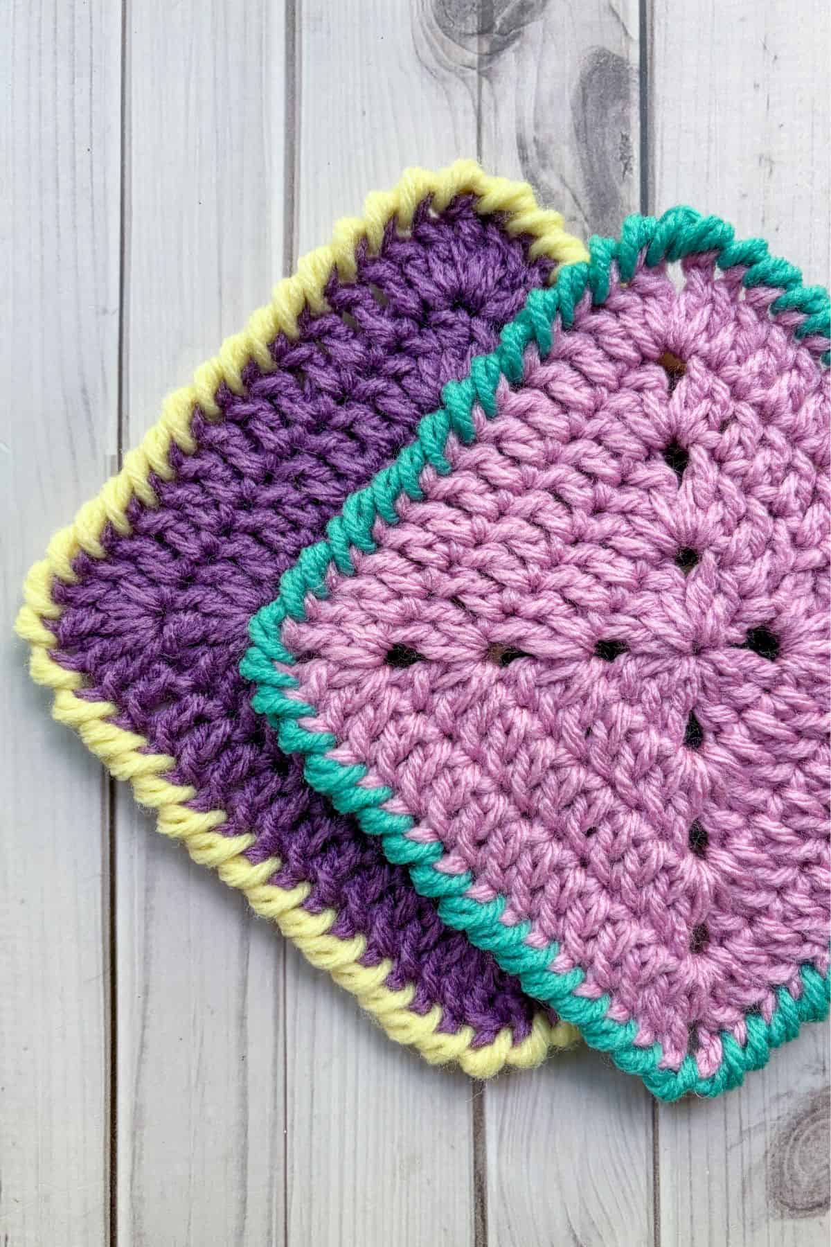 Finished crochet granny squares with crab stitch border.