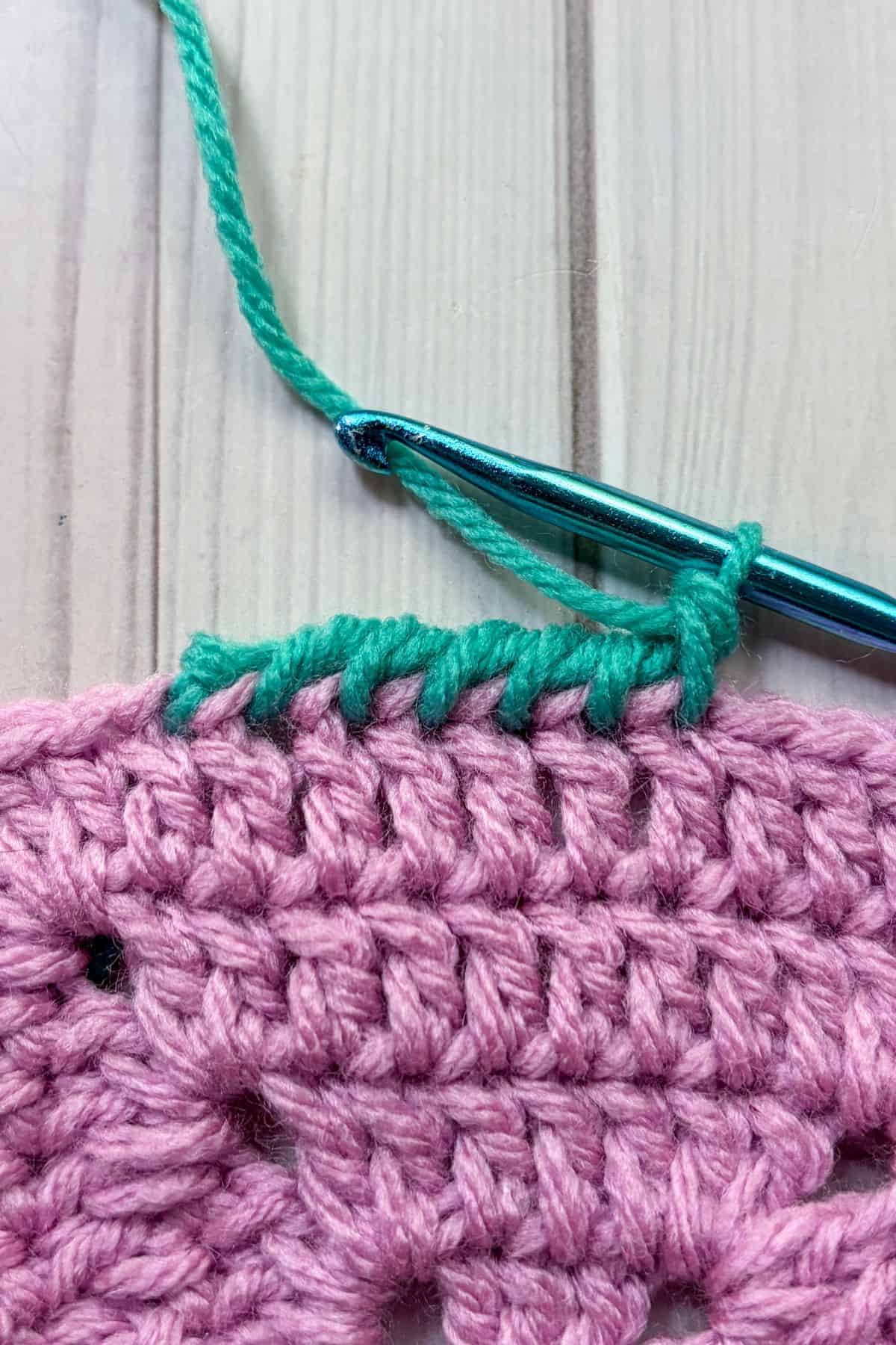 A few reversed single crochet stiches.