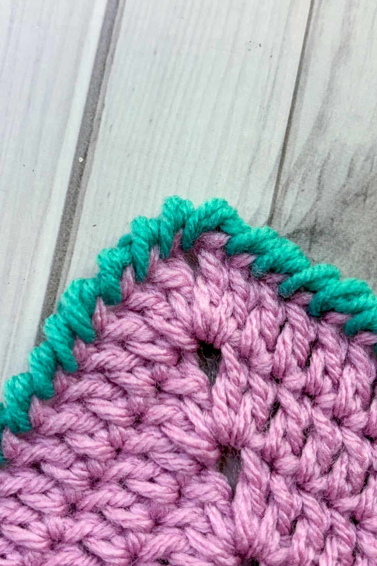 The corner of the crab stitch border.