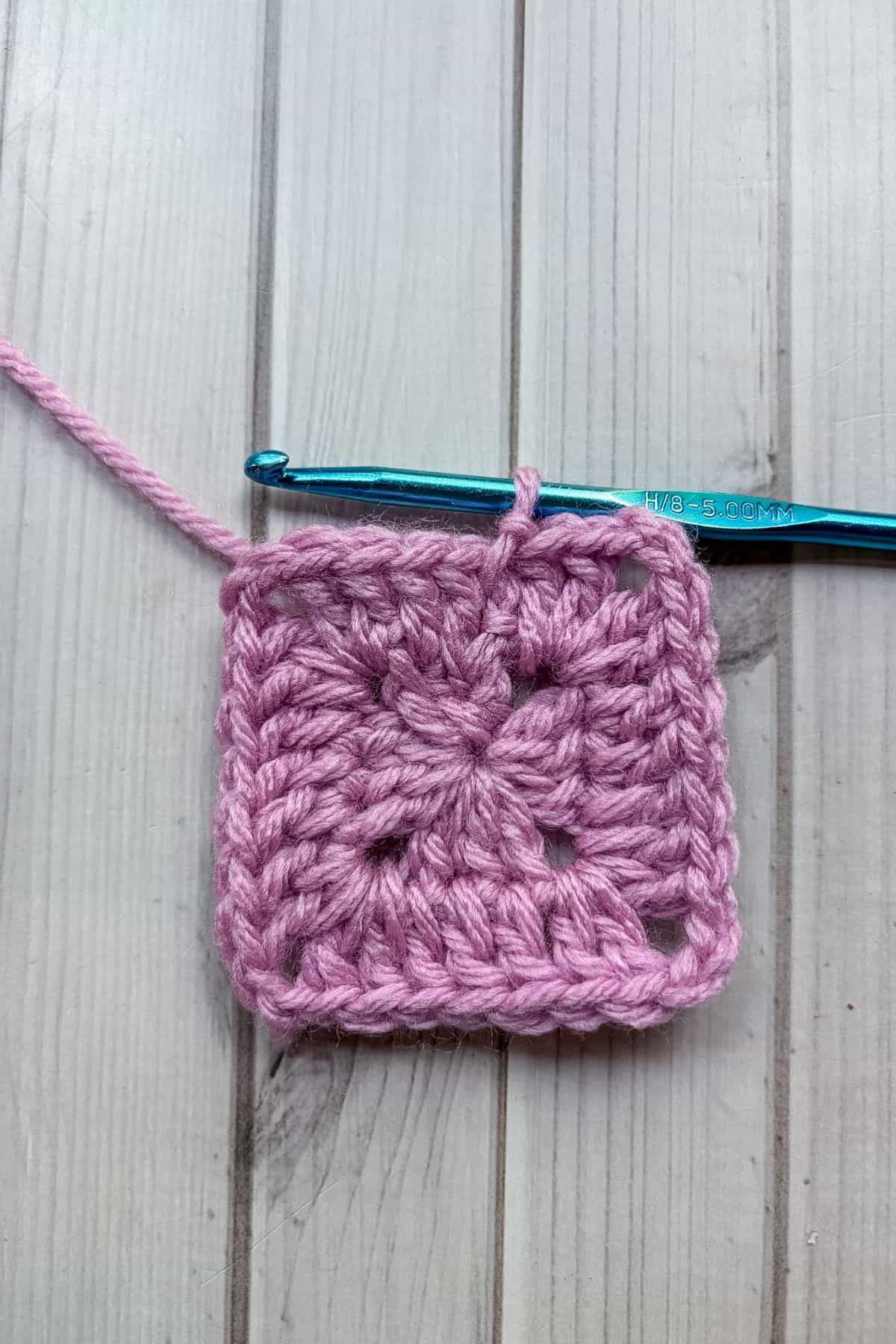 Finished second round of the solid granny square.