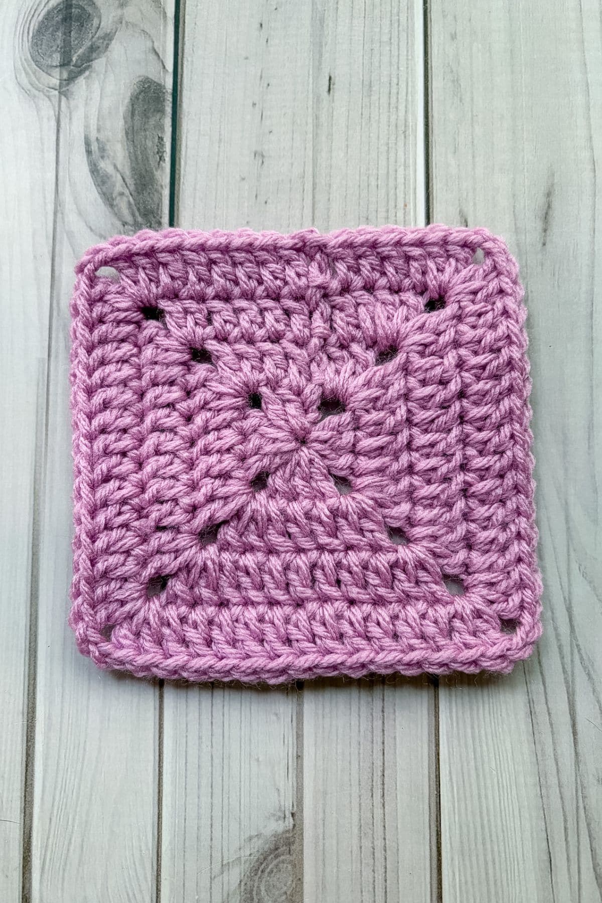 Finished solid granny square pattern.