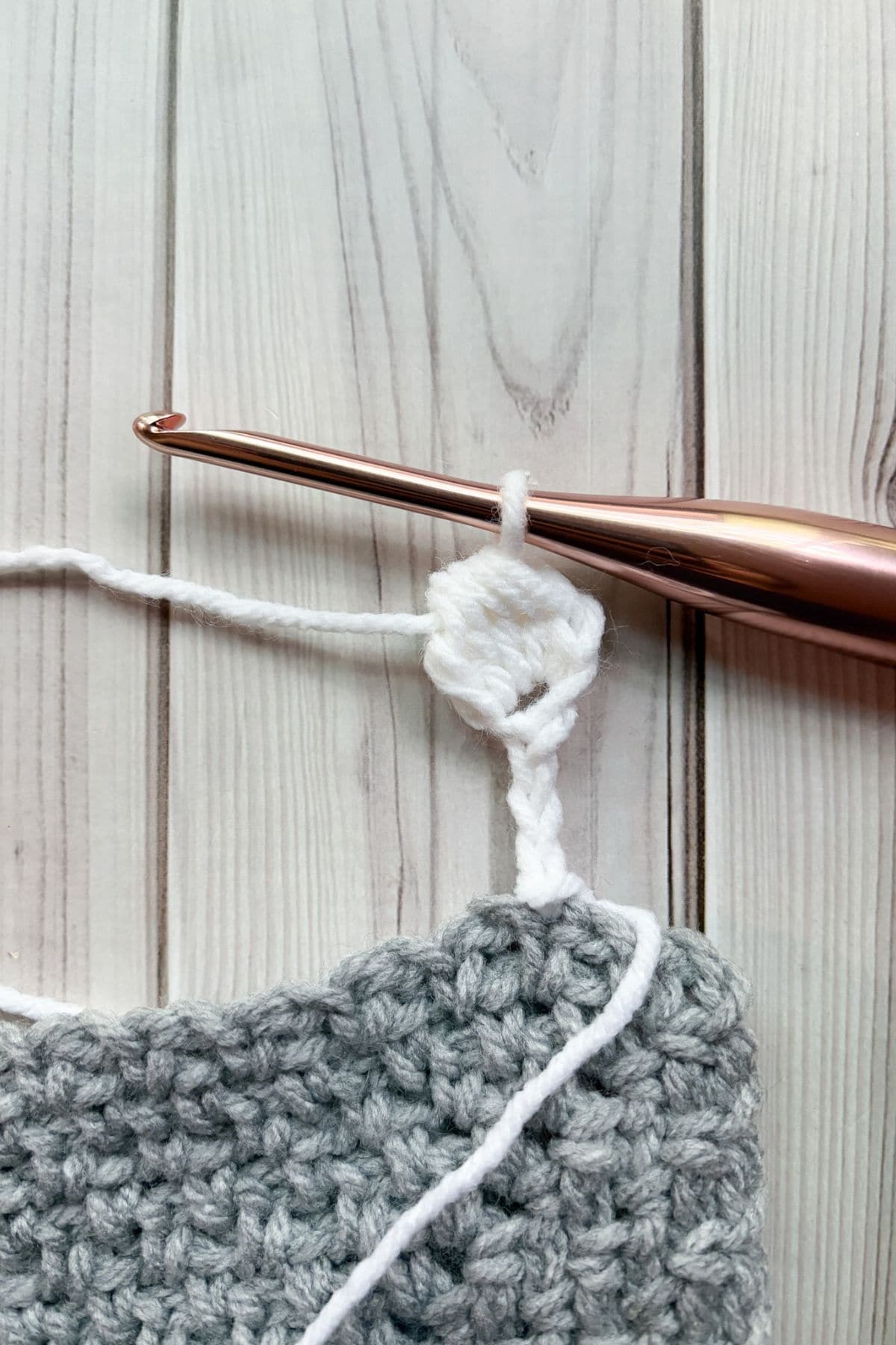 Halfway done making a crochet pompom.