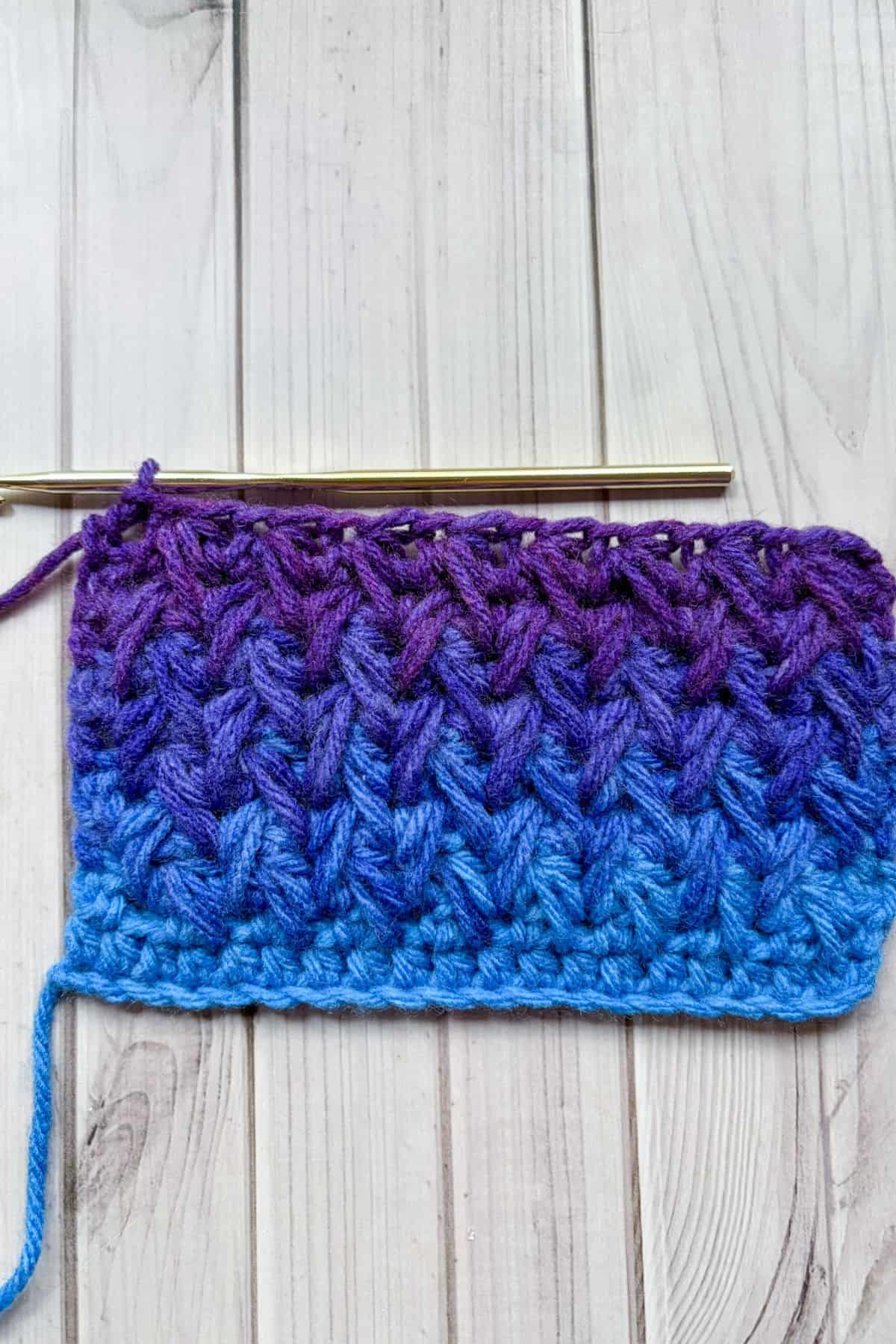 Finished crochet feather stitch swatch.