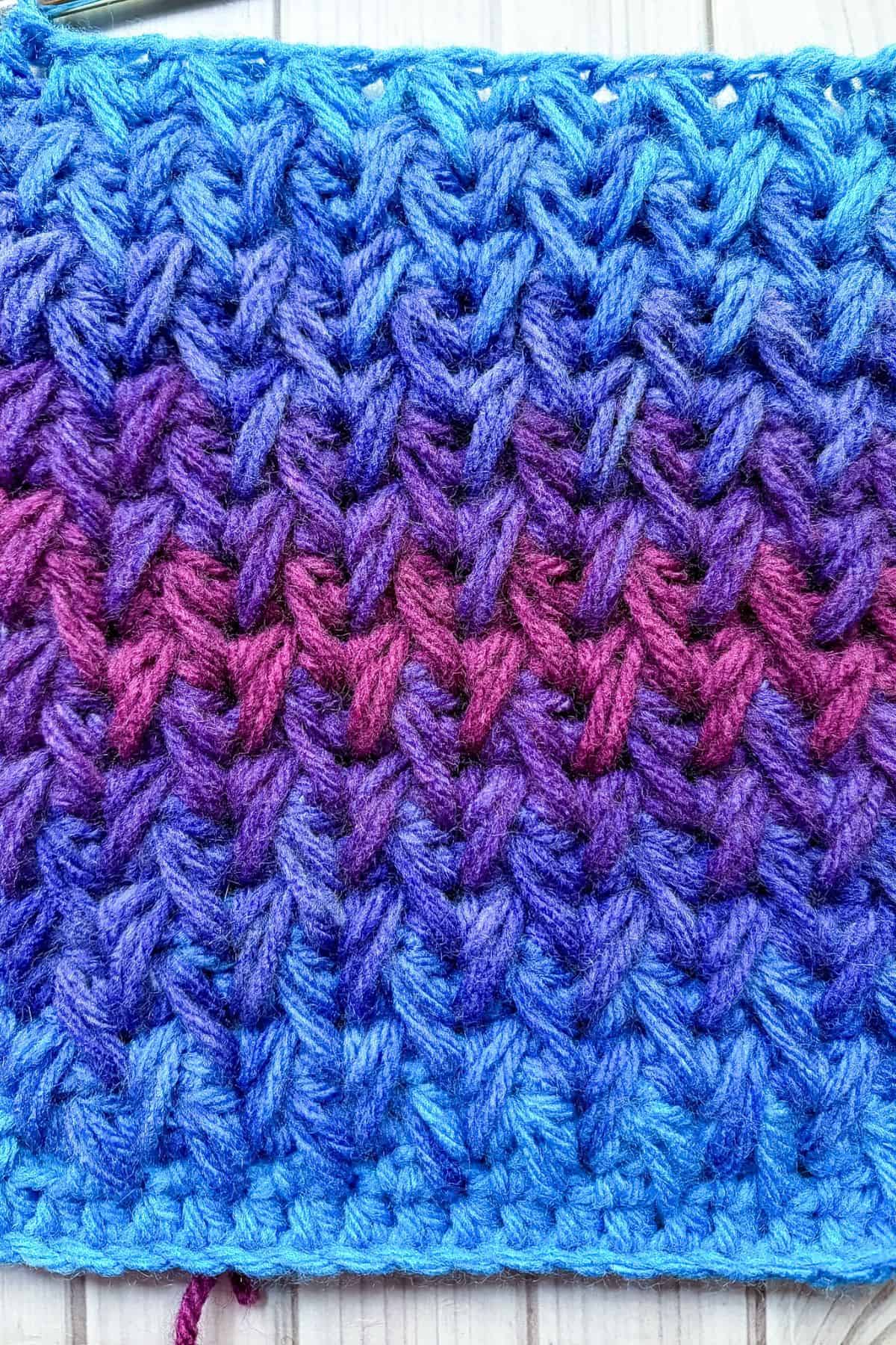 Finished crochet feather stitch swatch.