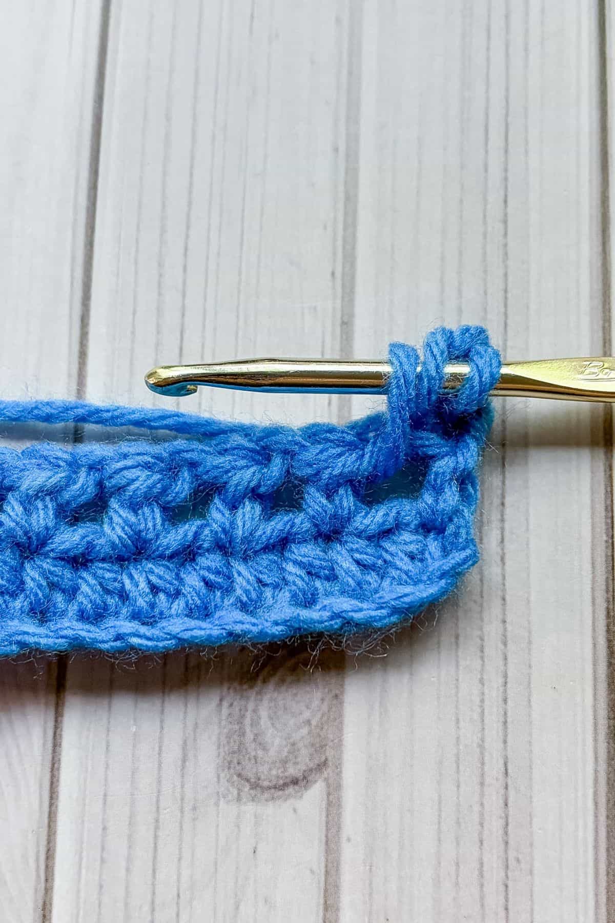 Making a feather stitch.