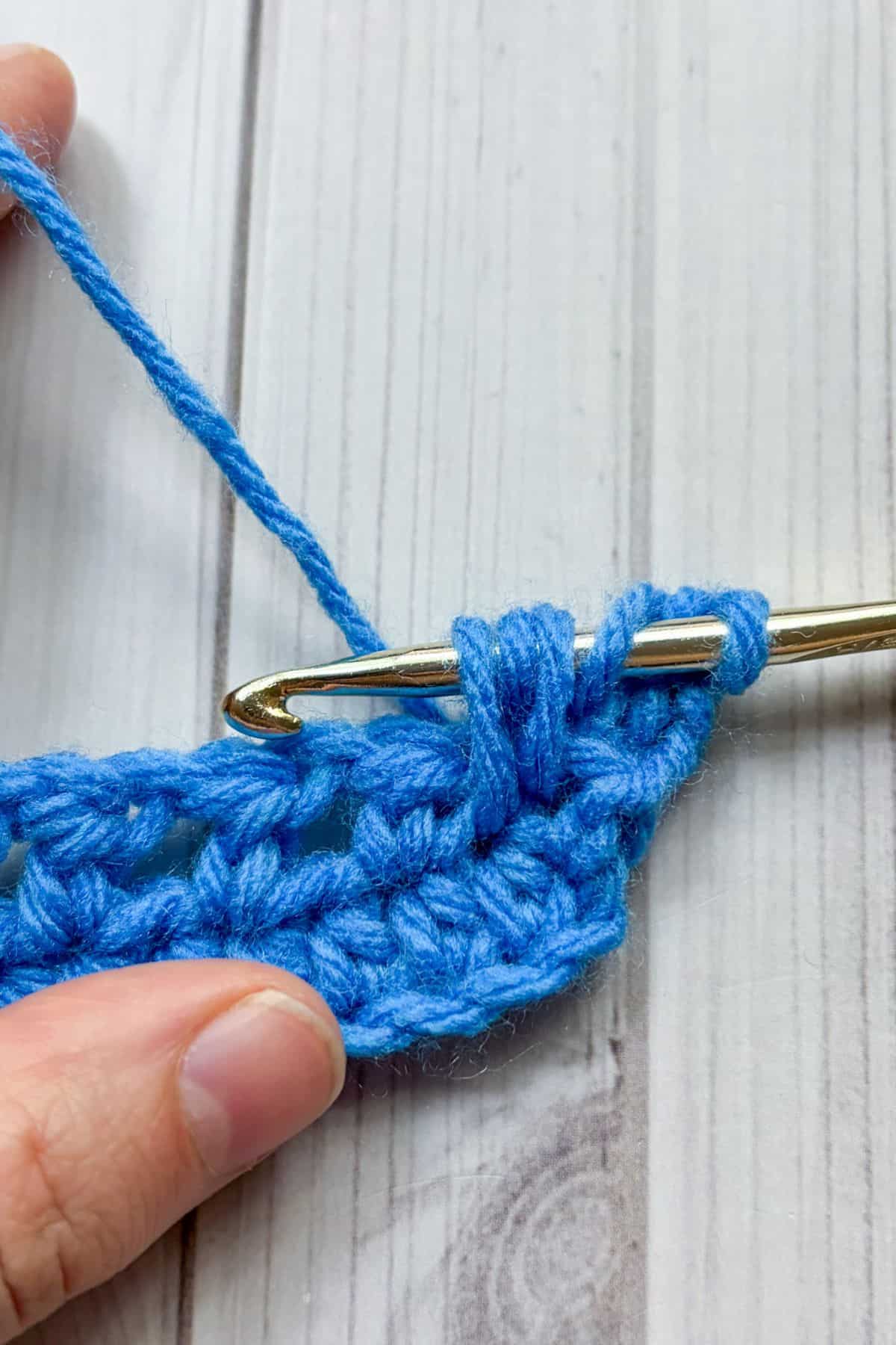 Making a feather stitch.