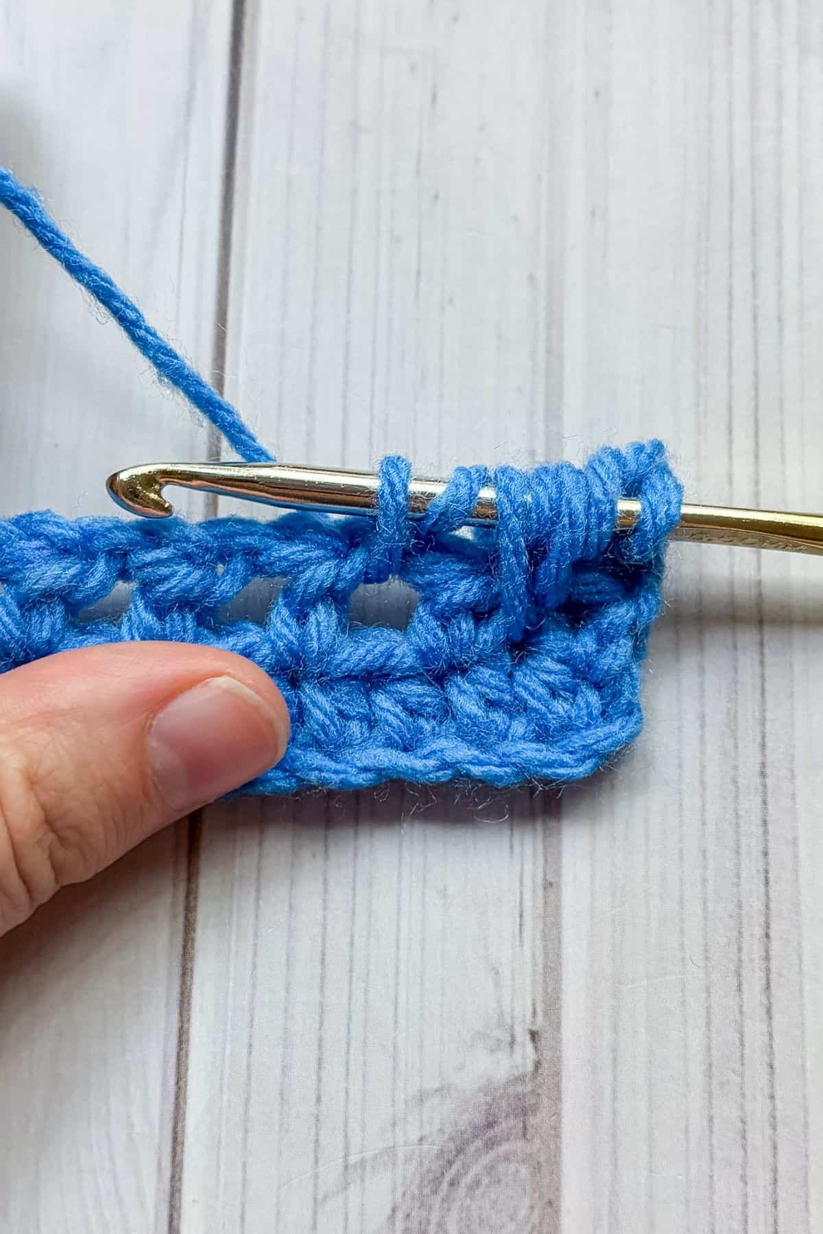 Making a feather stitch.