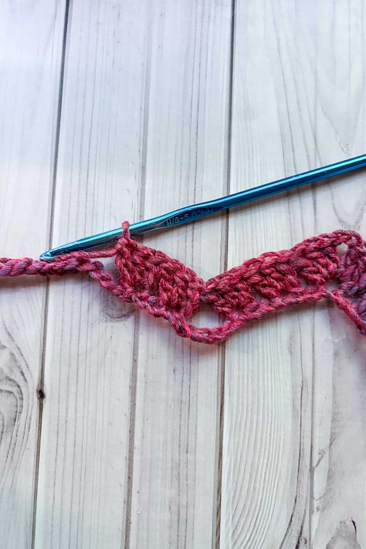 Showing how to do a valley of the granny chevron blanket.