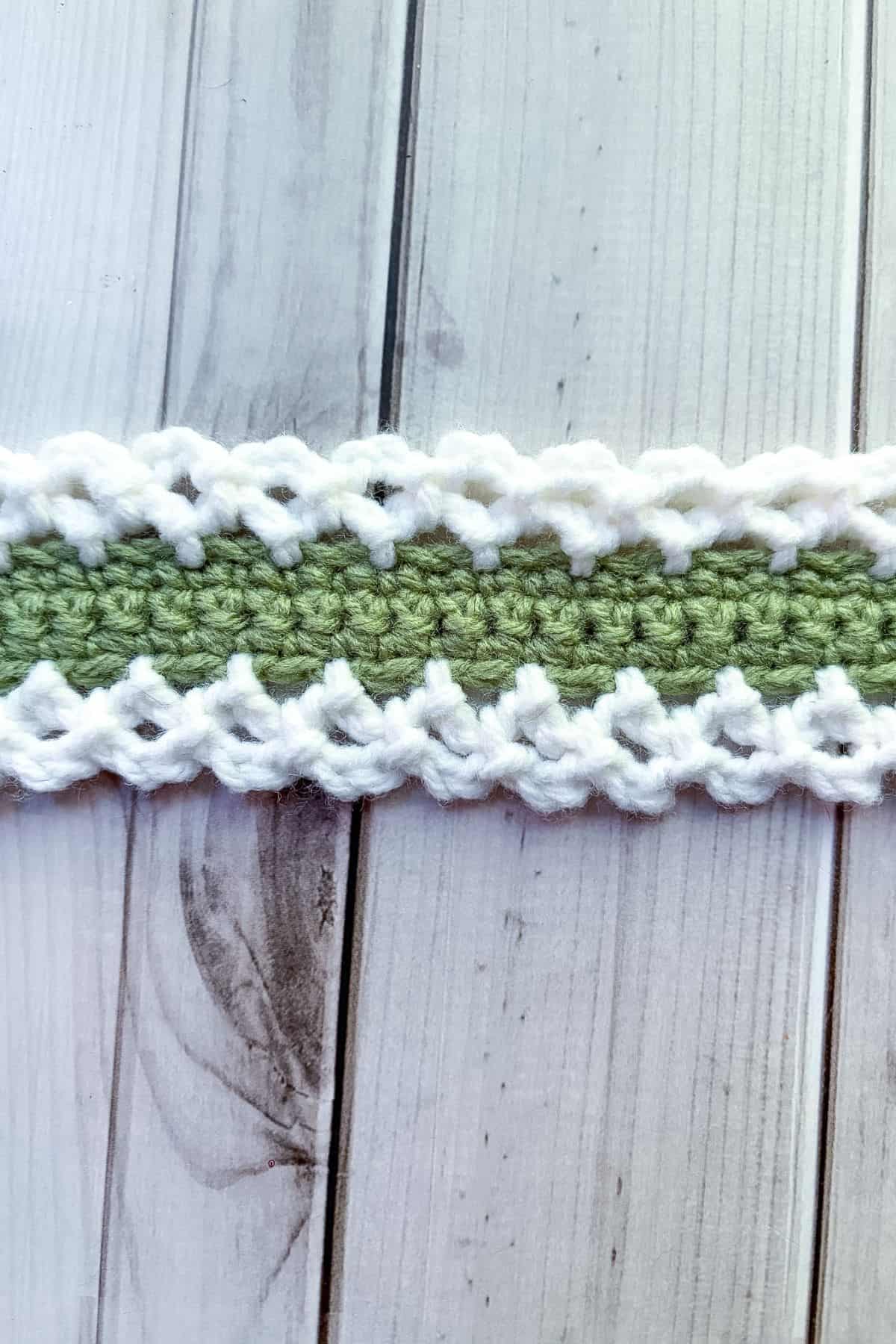 Crochet strap with frills.