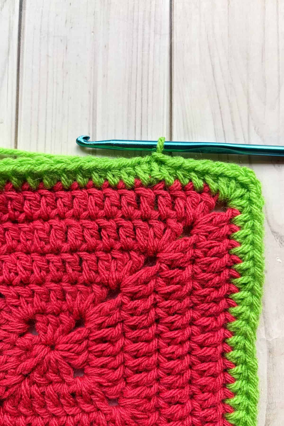 Finishing off the half double crochet border.